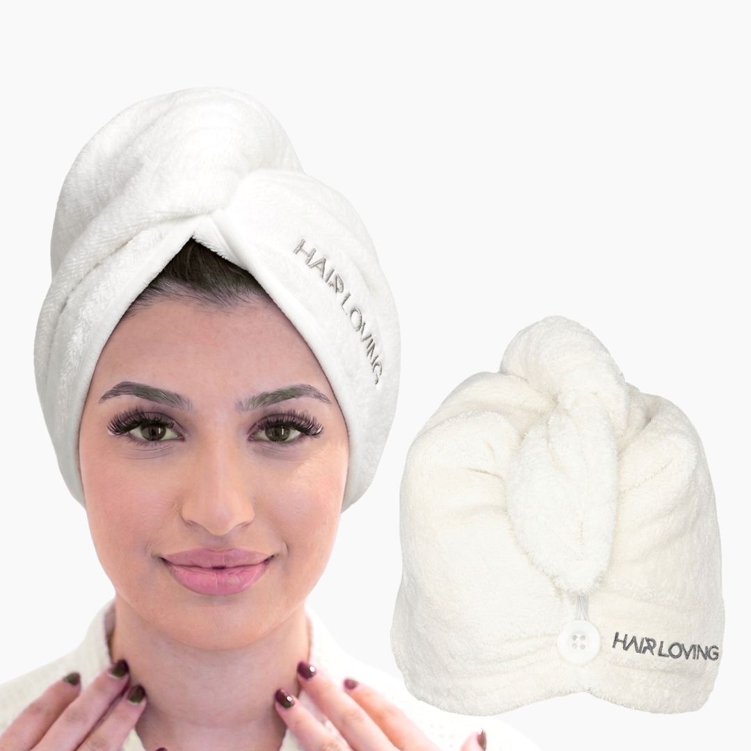 Hair Loving luxury white microfiber hair towel wrap worn by a model with healthy hair, showing super absorbent microfiber texture.