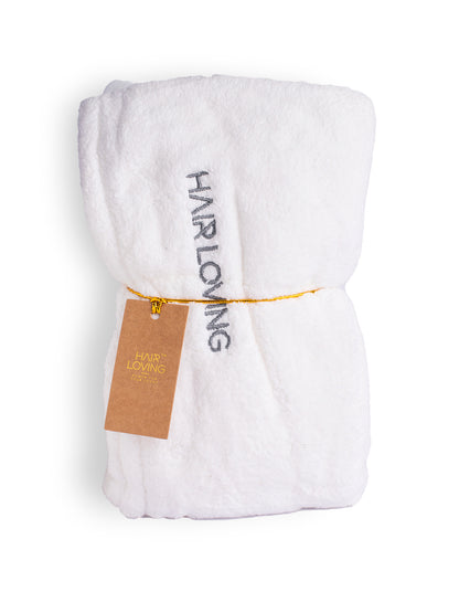 Two Hair Loving microfiber hair towel wraps in White and Chocolate Brown, showing color options.